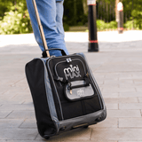 Aerolite MiniMAX trolley backpack being pulled on pavement