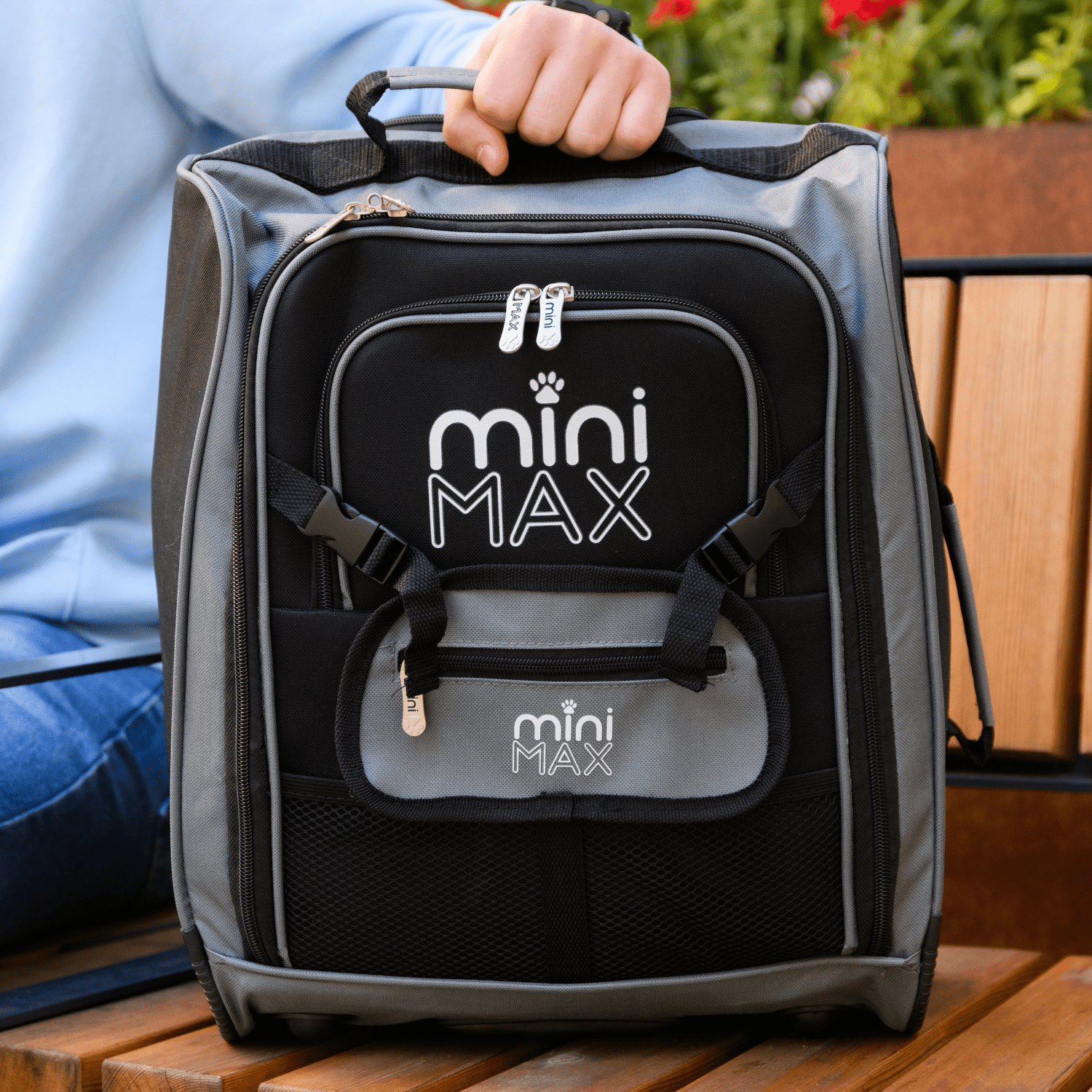 Close-up of Aerolite MiniMAX backpack on a bench